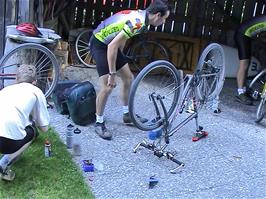 Bicycle repairs outside our hostel dorm at Brienz Youth Hostel